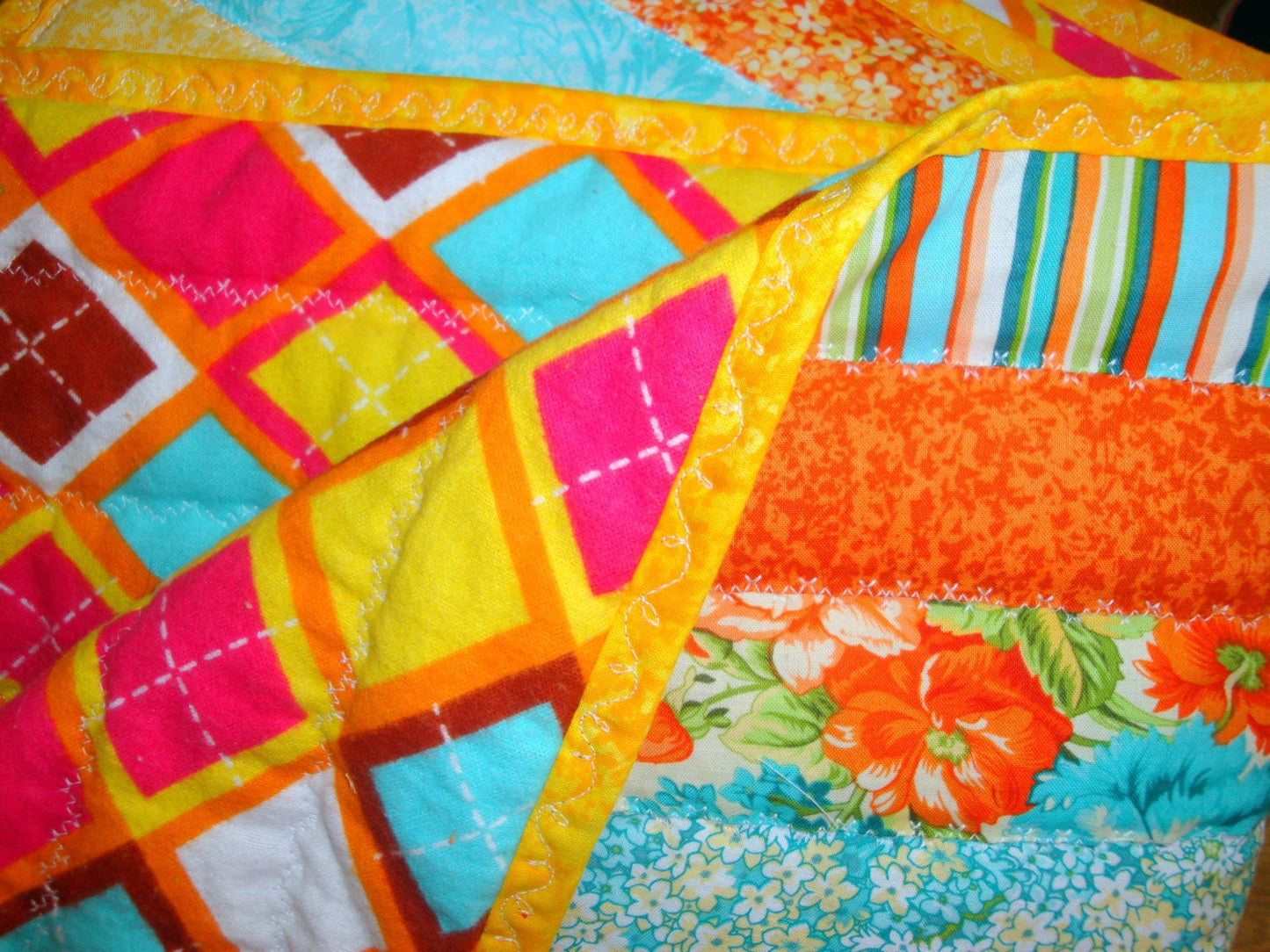 Baby Boy or Baby Girl Quilt - Jelly Roll Style with Flannel Back - Orange and Blue