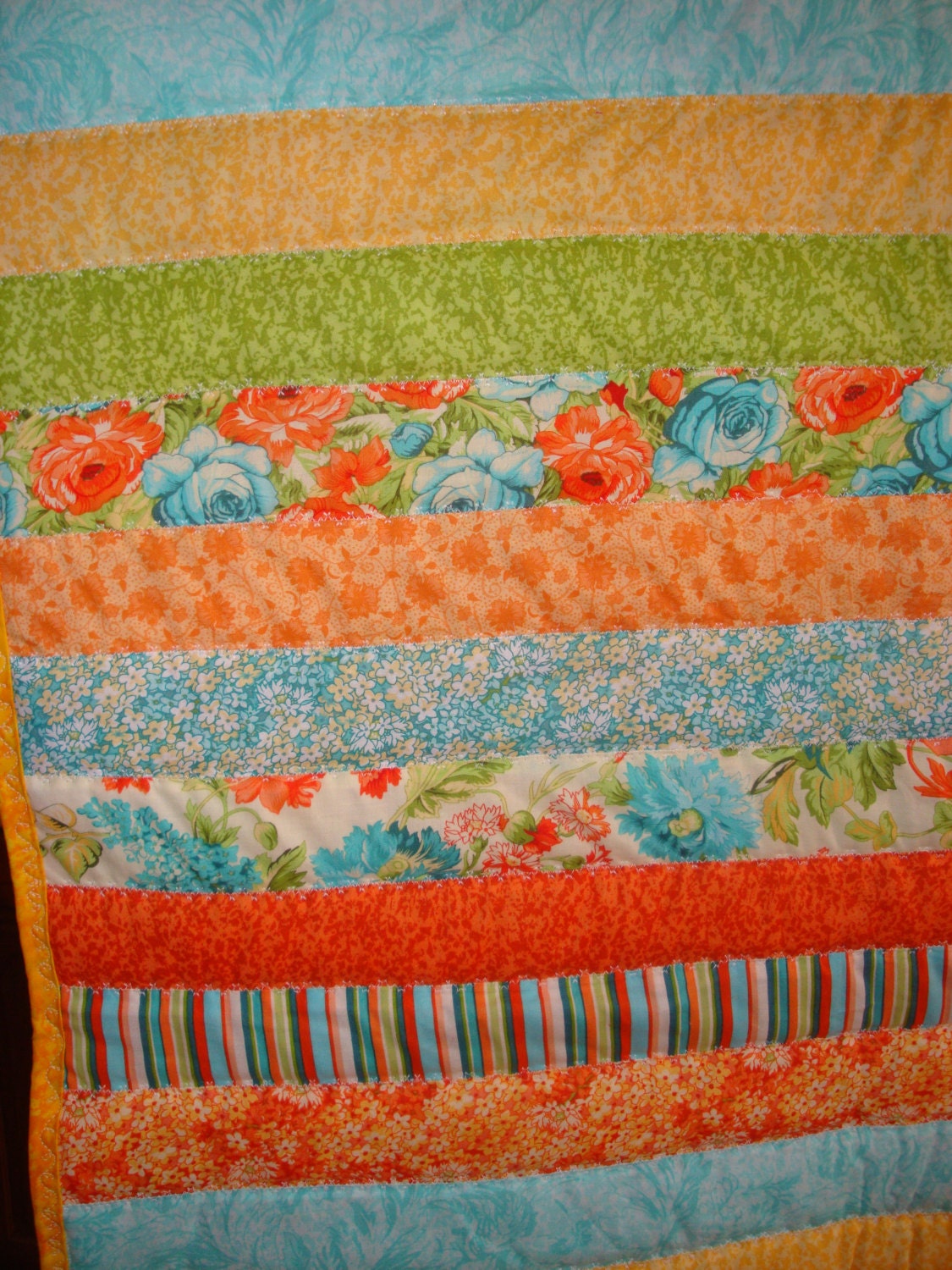 Baby Boy or Baby Girl Quilt - Jelly Roll Style with Flannel Back - Orange and Blue