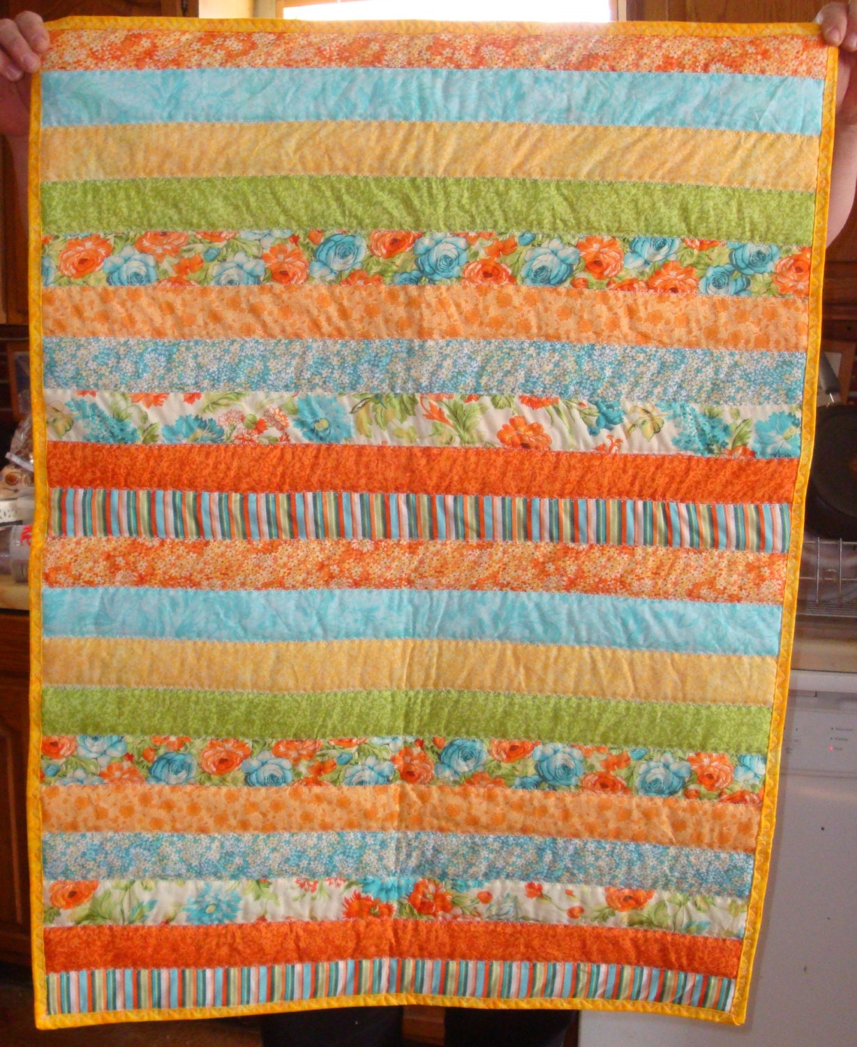 Baby Boy or Baby Girl Quilt - Jelly Roll Style with Flannel Back - Orange and Blue
