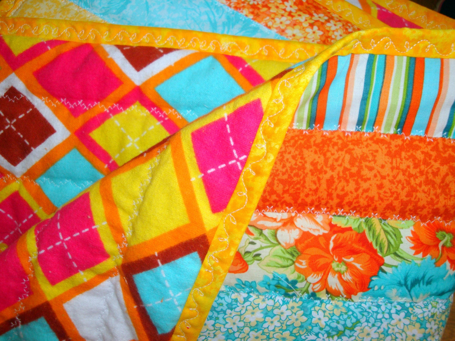 Baby Boy or Baby Girl Quilt - Jelly Roll Style with Flannel Back - Orange and Blue