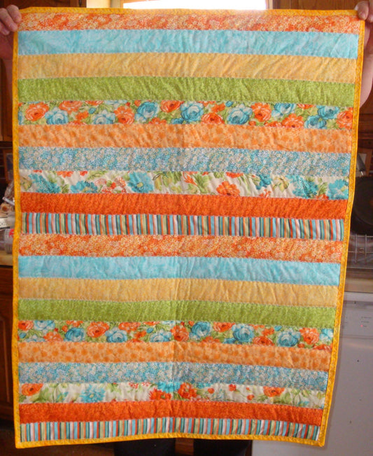 Baby Boy or Baby Girl Quilt - Jelly Roll Style with Flannel Back - Orange and Blue